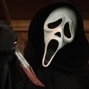 NECA's Ultimate Ghostface Inferno action figure is inspired by the Stab 8 flamethrower moment in Scream (2022)