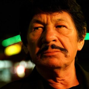 Charles Bronson look-alike Robert Bronzi stars in the werewolf thriller 12 to Midnight alongside Daniel Roebuck, Sadie Katz, and Tito Ortiz