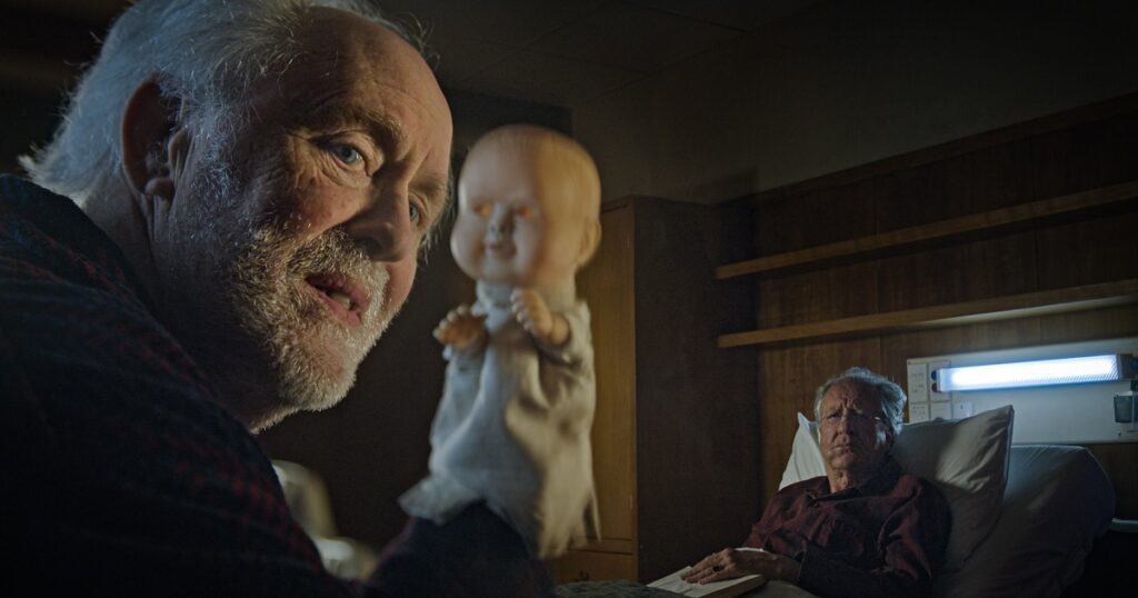 The Rule of Jenny Pen: John Lithgow torments Geoffrey Rush with a doll in March horror film